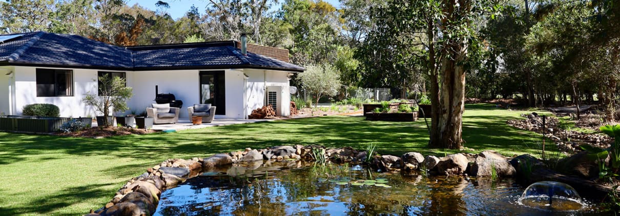 Chandler pond and edible gardens, Turning a boring acreage property into a lush landscape with water features.