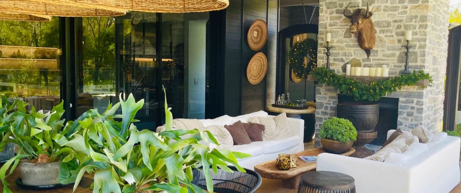 Landscaping Services Brisbane Live Outdoors 26, Beautiful outdoor furniture under a home patio, Live Outdoors, Landscape design experts.
